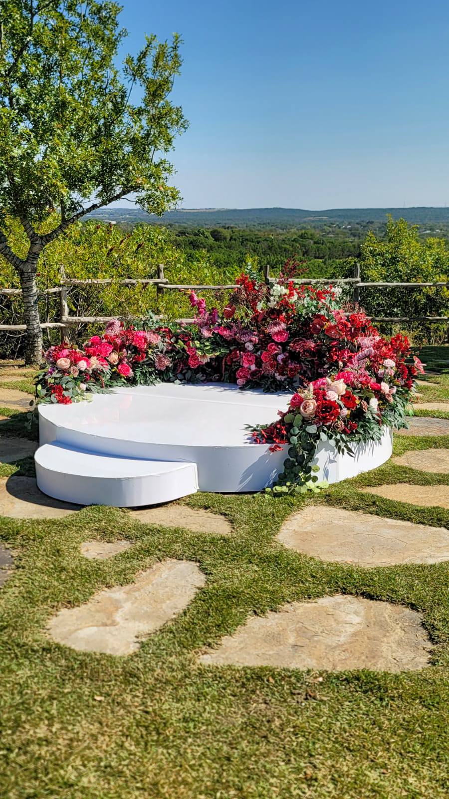 Outdoor Floral Celebration by Gigi Backdrops